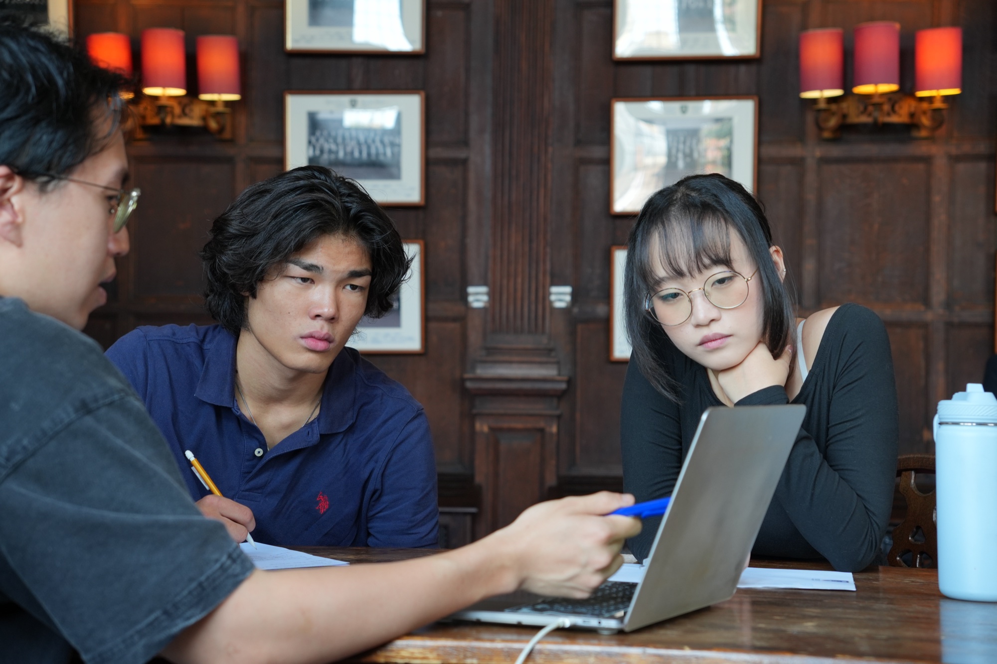 Students taking part in an Oxford-style tutorial